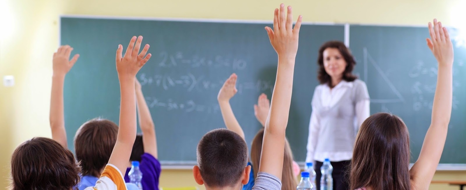 cropped-cropped-kids-raising-hands1